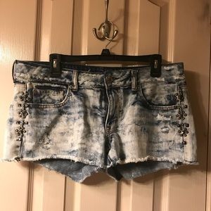 Light washed distressed embellished denim shorts